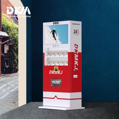 China SDK DKMVending 32 inch touch screen laser vending machine souvenir free standing custom commemorative outdoor professional coin for sale