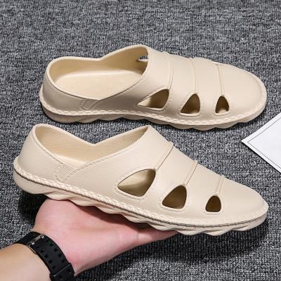 China New Summer Border Large Size Men's Lightweight Beach Sandals Anti-slippery Shape Trend Leisure Driving Men's Sandals Shoes for sale