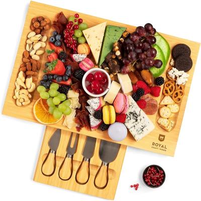 China Wholesale Kitchen Sustainable Organic Natural Extra Large Bread Cheese Bamboo Cutting Board With Knives Set Cutting Plates for sale