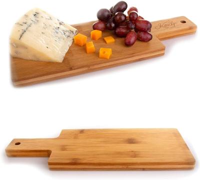 China Sustainable Kitchen Gift Set Dark Color Wooden Trim Serving Board, Wooden Cutting Board With Handle for sale