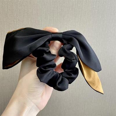 China Casual Bow scrunchie head rope Womens Designer Headband Print Hair Ties Twist Hairband  Scarf Hair Accessories for sale