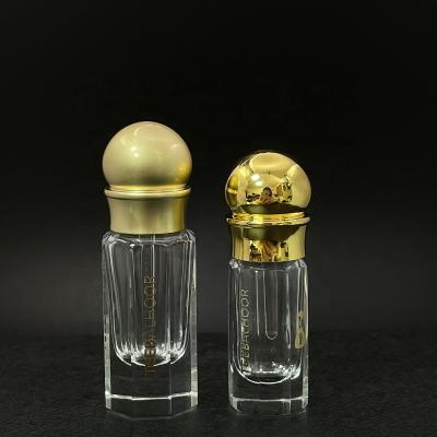 China Fancy Gold Personal Care BOM Octagon Bottle 3ml 6ml Long Arabic Oud Essential Oil Bottle Matte Essence Glass With Gold Cap for sale