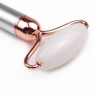 China Hot New Face Product Natural Jade Roller Gua Sha Face Electric Vibrating Facial Roller for sale