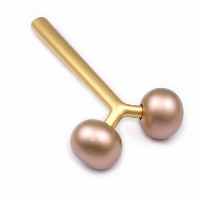 China Face Lift Gold Metal Slimming Body Health Care Facial Massager Gua Sha Face Roller for sale