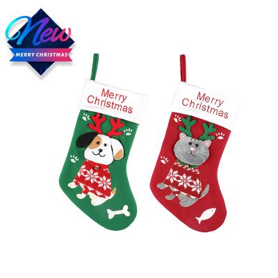 China Pile wholesale knit Christmas candy gift jars decoration clothes jars socks Santa Candy Bag Christmas Stocking for sale