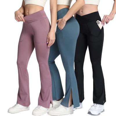 China Breathable Women's Casual Bootleg Yoga Pants Crossover V High Waisted Rocket Workout Sports Leggings With Pockets for sale