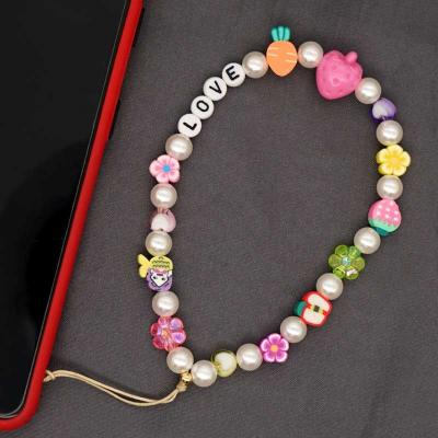 China For mobile glasses/white pearl necklace/bracelet design 2021 popular colorful beaded phone chain with smile star phone strap for girl for sale