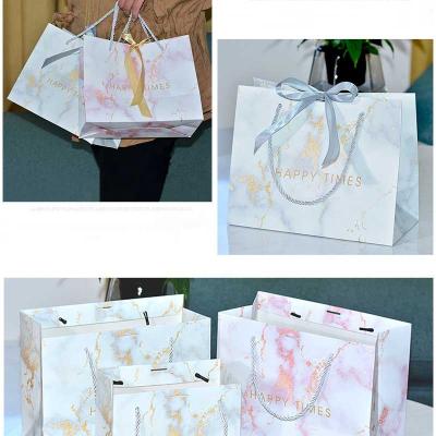 China Custom logo gift biodegradable jewelry bulk candy paper bags wholesale fancy personalized marble paper bag for sale