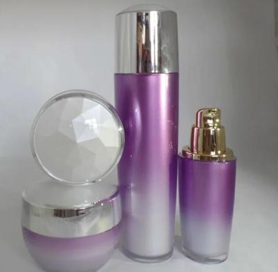 China Unique New Design Custom purple Color Cosmetic Packaging Sets Acrylic Bottle And Cosmetic Cream Jar For Skin Care for sale