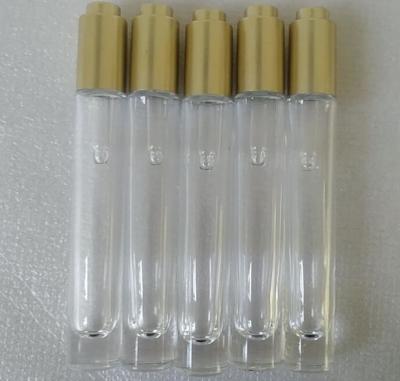 China transparente leere Glastropfflasche 10ml mit Goldpresse zu verkaufen