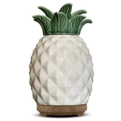 China Low Moq and Hotel Pineapple Porcelain Humidifier Private Label Oil Diffuser Electric Ceramic Essential Perfume Best Supplier for sale