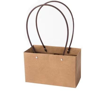 China Hot Selling Biodegradable Flower Paper Bag Paper Gift Bag Display Bag for sale