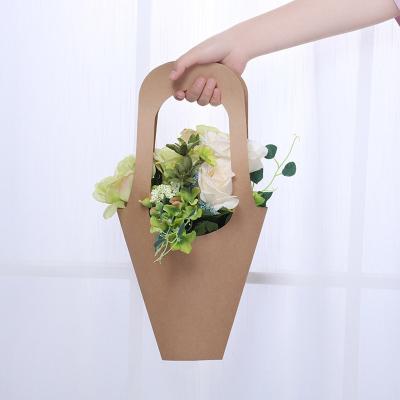 China Biodegradable Hanging Flower Shop Paper Bag Flower Portable Packaging Bag for sale