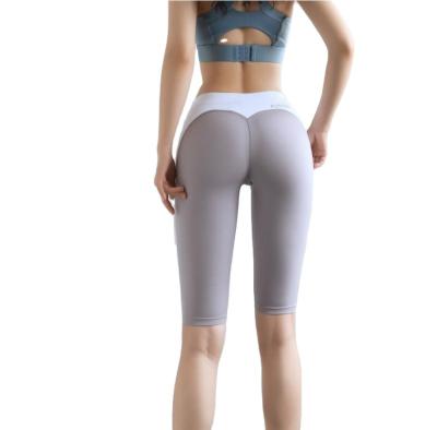 China New Breathable Yoga Leggings Womens Sports Shorts Fitness Tight Quarter Pants Fast Dry Running Shorts for sale