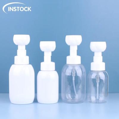 China Kosmetische Flasche 300/500ml Schaumbottel Seifenverdeckung mit Blumenform Pumpe Gesichtsreiniger Handwaschflasche zu verkaufen