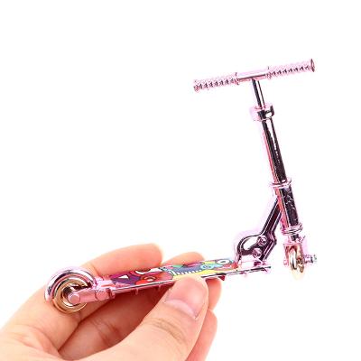 China Folding Educational Fingertip Skateboard Children's Two-Wheel Mini Simulation Finger Scooter Model Cartoon Toy Elf Doll Accessories Spin for sale