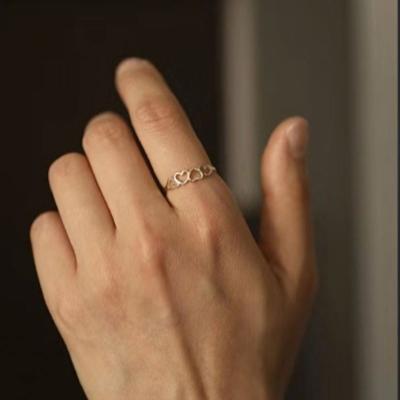 China Lead Free Nickel Free 18K Gold High End Single Cavity Out Love Heart Rings Fashionable Simple Stainless Steel Gold Plated Jewelry for sale