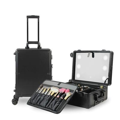 China Rolling Makeup Case LED Light Mirror Adjustable Legs Lockable Train Table Studio Artist Cosmetic Case For Women And Girls for sale