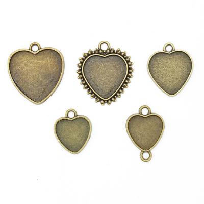 China Environmental Friendly Antique Silver Antique Bronze Heart Shaped Neck Bow Tone Fashion Pendant Tray Link for sale