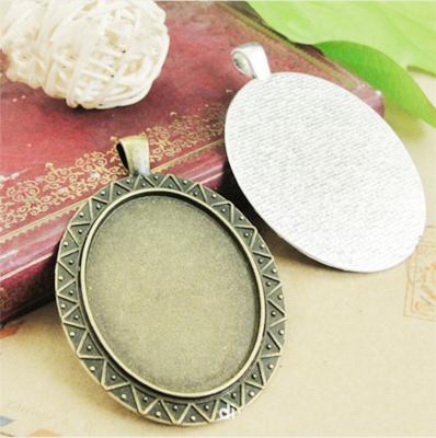 China DIY Accessories 30mmx40mm Bezel Tray Necklace Eco Friendly High Quality Oval Zinc Alloy Pendant for sale