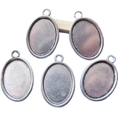 China High Quality And Low Price Eco Friendly Cabochon Oval Fit 18mmx25mm Bezel Around Empty Coin Pendant for sale