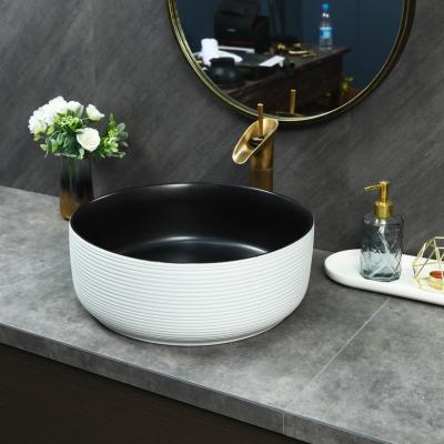 China Traditional Modern All Matched Outside Vanity White And Interior Black Porcelain Hand Painted Color Basin for sale