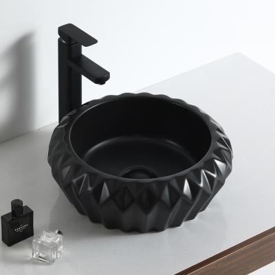 China Modern Matt Black Diamond Style Bathroom Vanity Top Ceramic Washbasin Price India for sale