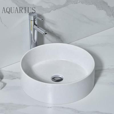 China Modern Art White Rock Board Bathroom Basin Sink UK Wash Sink Designs Resin Stone Wash Basin for sale