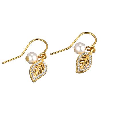 China Cool Punk Female Hollowed Small Leaves Vintage French Diamond-encrusted Leaf Pearl Earrings Delicate Sweet Earrings for sale