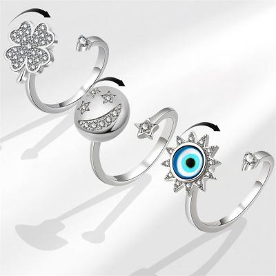 China TRENDY Clover fingertips swirling magic eye silver jewelry fingertip ring anxiety women jewelry for sale