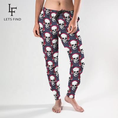 China Fashion breathable wholesale sweatpants skulls patternedspandex custom sublimation printed women tracksuits for sale