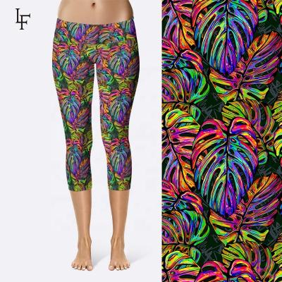 China Sexy Women 92% Polyester 8% Spandex Breathable High Waist Capri Leggings Custom Made Tropical Leaves Patterned Fabric Yoga Pants for sale