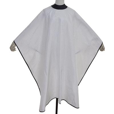 China Waterproof/anti static/pro stretch fabric waterproof fine hair trimming cape Barber Gown with snap button pro stretch haircut cape for sale