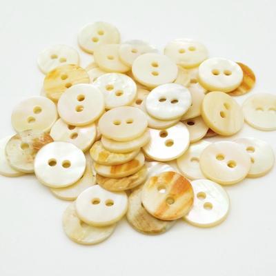 China Dry clean 16L 10mm 2 hole abalone shell button in bleached white color, natural shell button for shirt for sale