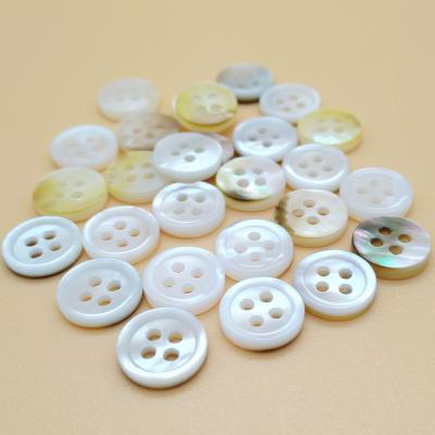 China Dry cleaning 9mm 14L 4 holes WIPE shell button, one side white pearl shell button for sale