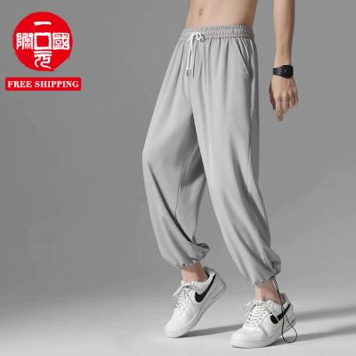 China Summer QUICK-DRY Thin Ice Silk Straight-Leg Pants Loose Sports Casual Quick-Drying Feet Men's Drawstring Breathable Pants for sale