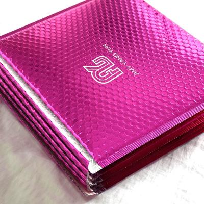 China Custom Copy Strong Adhesive Plum Gloss Bubble Metallic Mailer Bag For Wigs for sale