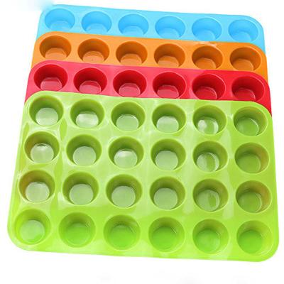 China Sustainable Silicone Muffin Pan Cupcake Molds Regular 24 Cup Muffin Tins, Non-Stick B. P.A. Free Food Grade Silicone Molds Baking Cups for sale