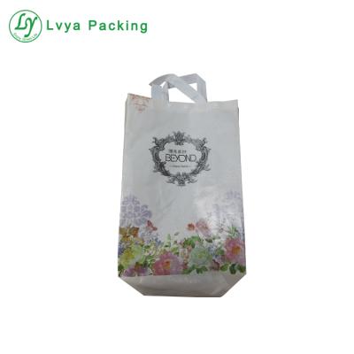 China Customized Leather Non Woven Bag Handled Lamination Foldable Reusable Long Handle Shoe Packaging Shopping PP Bag for sale