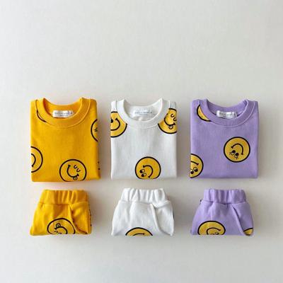 China 2021 Summer Casual Wholesale Smile Face Short Sleeve Baby Clothing Sets for sale