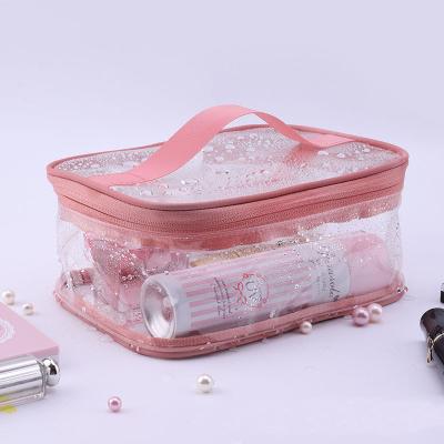 China Hot Selling High Quality Fashion Amazon Travel Large Toiletry Bag For Girls Sweep Reusable Clear Makeup Bag TPU Waterproof Cosmetic Bag for sale