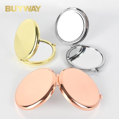 China Customized Lighted Logo Round Double Side Metal Pocket Mirror Gold Plated Make Up Mini Mirror for sale