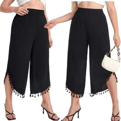 China 2021 Autumn Waterproof Women Clothes Casual Solid Black Tassel Midi Pants Women Jeans Pants With Side Slit for sale