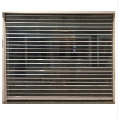 China Hot Selling Bar Crystal Polycarbonate Transparent Rolling Shutter Door Heat Insulation Manufacturer For Shops for sale