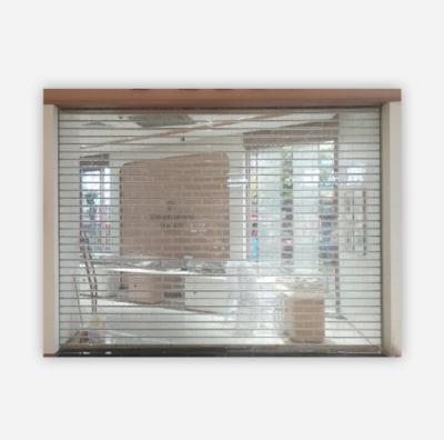 China Thermal Insulation Fashion Style Crystal Door Transparent Clear Rolling Door For Supermarket for sale