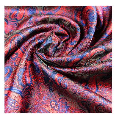 China Polyester Woven Jacquard Floral Plain Paisley Tie Custom Garment Fabric Netting Shrink-Resistant for sale