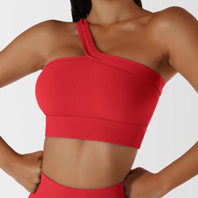 China Wholesale Custom Breathable Logo Gym Athletic Fitness Ribbed One Shoulder Sports Bra Top Fitness Sports Wear For Women for sale