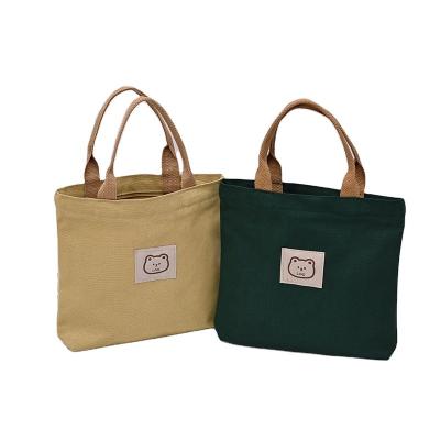 China Reusable Fashional Handled Customized Color Standard Size Women Canvas Tote Shopping Bag for sale