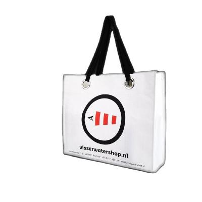 China Wholesale Reusable White Customized Nonwoven Handled Waist Circle Opening Tote Shopping Bag With Logo for sale