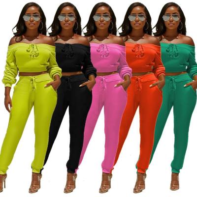 China 2021 Falls Breathable Long Sleeve Crop Top And Pants Tracksuits 2 Pieces Set Women Off-Shoulder Bandage Two Piece Sets for sale